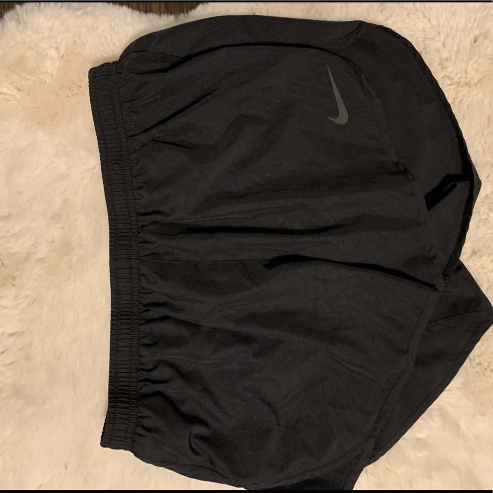 black Nike running shorts